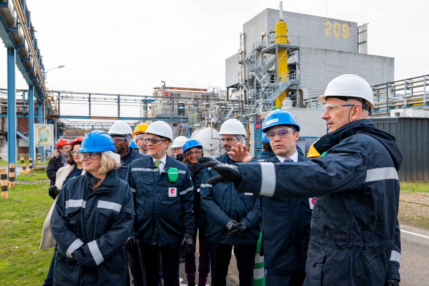 Crew of employees touring a facility
