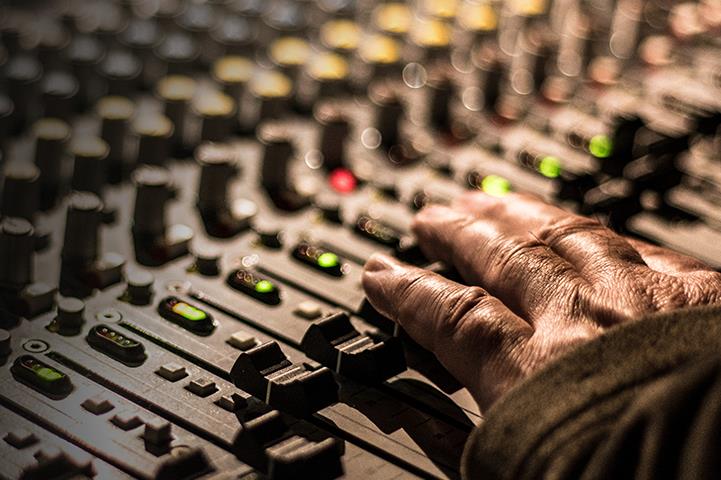 hand on a soundboard