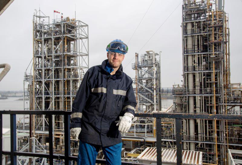 Operator Bastiaan leaning on a hand-rail
