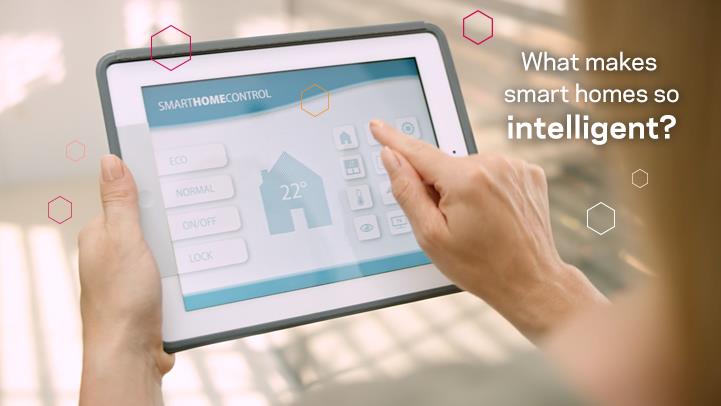 person holding smart home control device