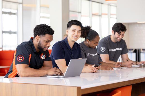 students working at a desk