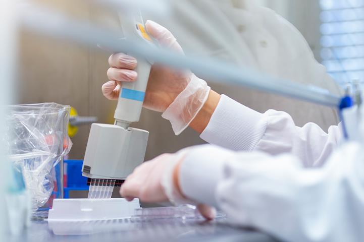 scientist performing experiment
