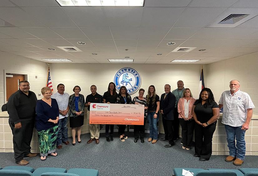 Ingleside ISD School Board Members, Superintendent of Schools, and Leon Taylor Middle School Principal pictured with Chemours Representatives during Ingleside ISD School Board Meeting