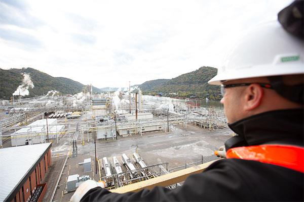 Employee looking down at facility