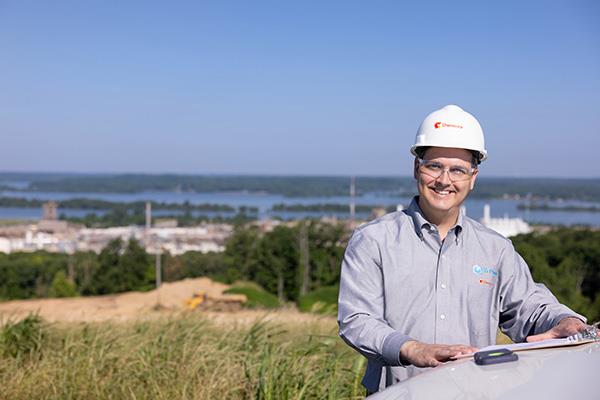 Man in hardhat outside 