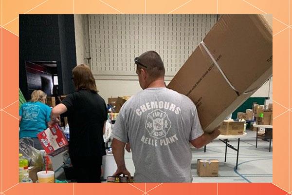 People carrying a box